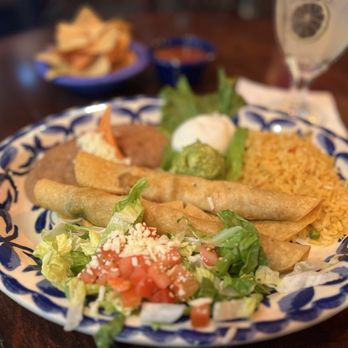 Mi Tierra Cafe y Panaderia signature dishes Enchiladas Verdes
Tres Leches
Chile Con Queso